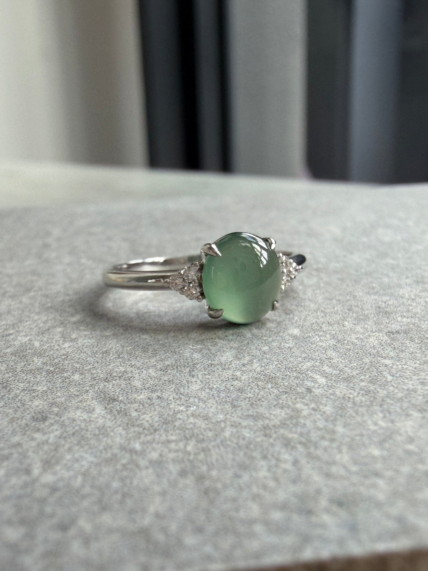 JO230016 A Drop in the Lake | Icy Blue watery jadeite cabochon in 18K white gold with natural diamonds