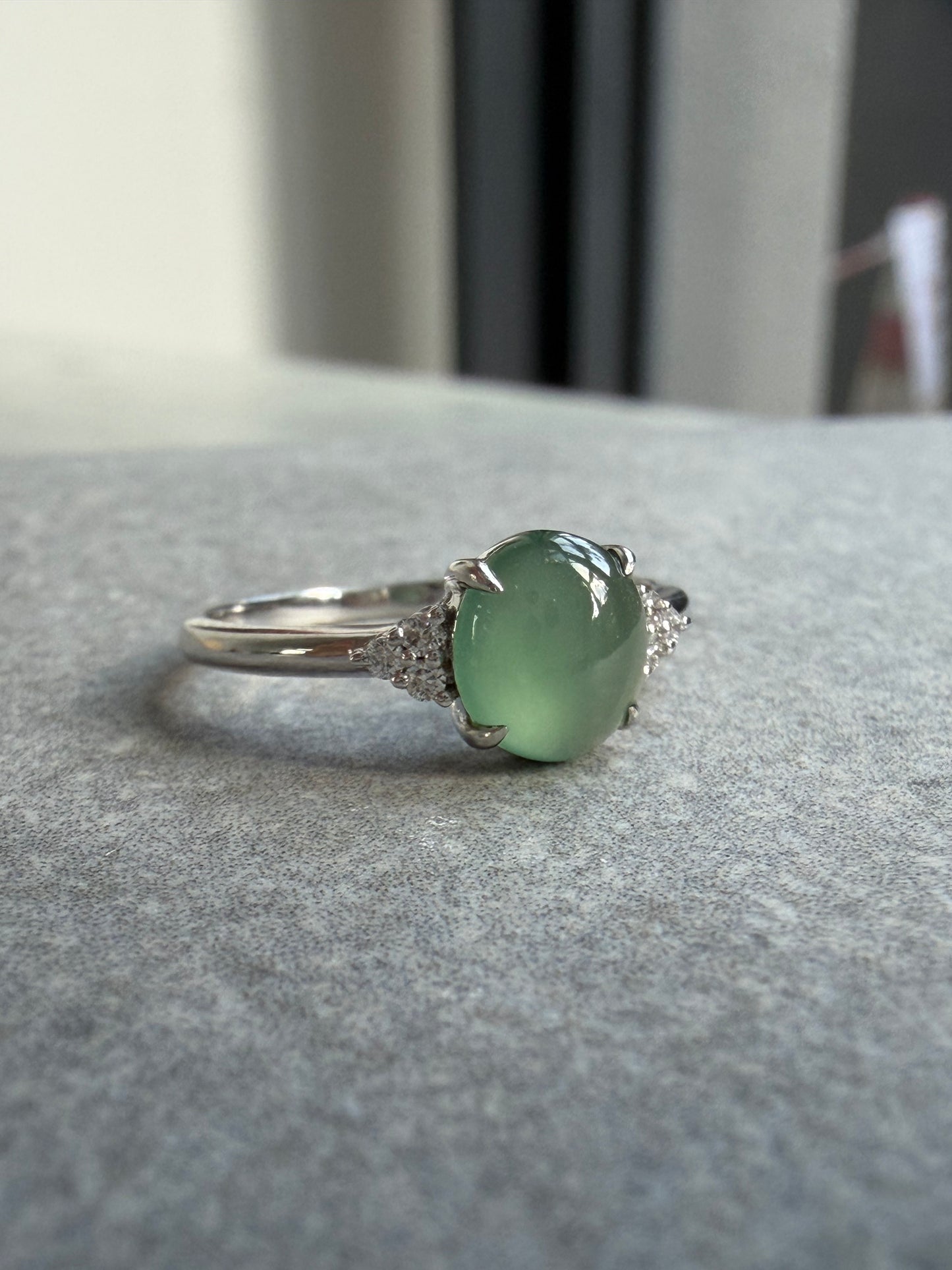 JO230016 A Drop in the Lake | Icy Blue watery jadeite cabochon in 18K white gold with natural diamonds