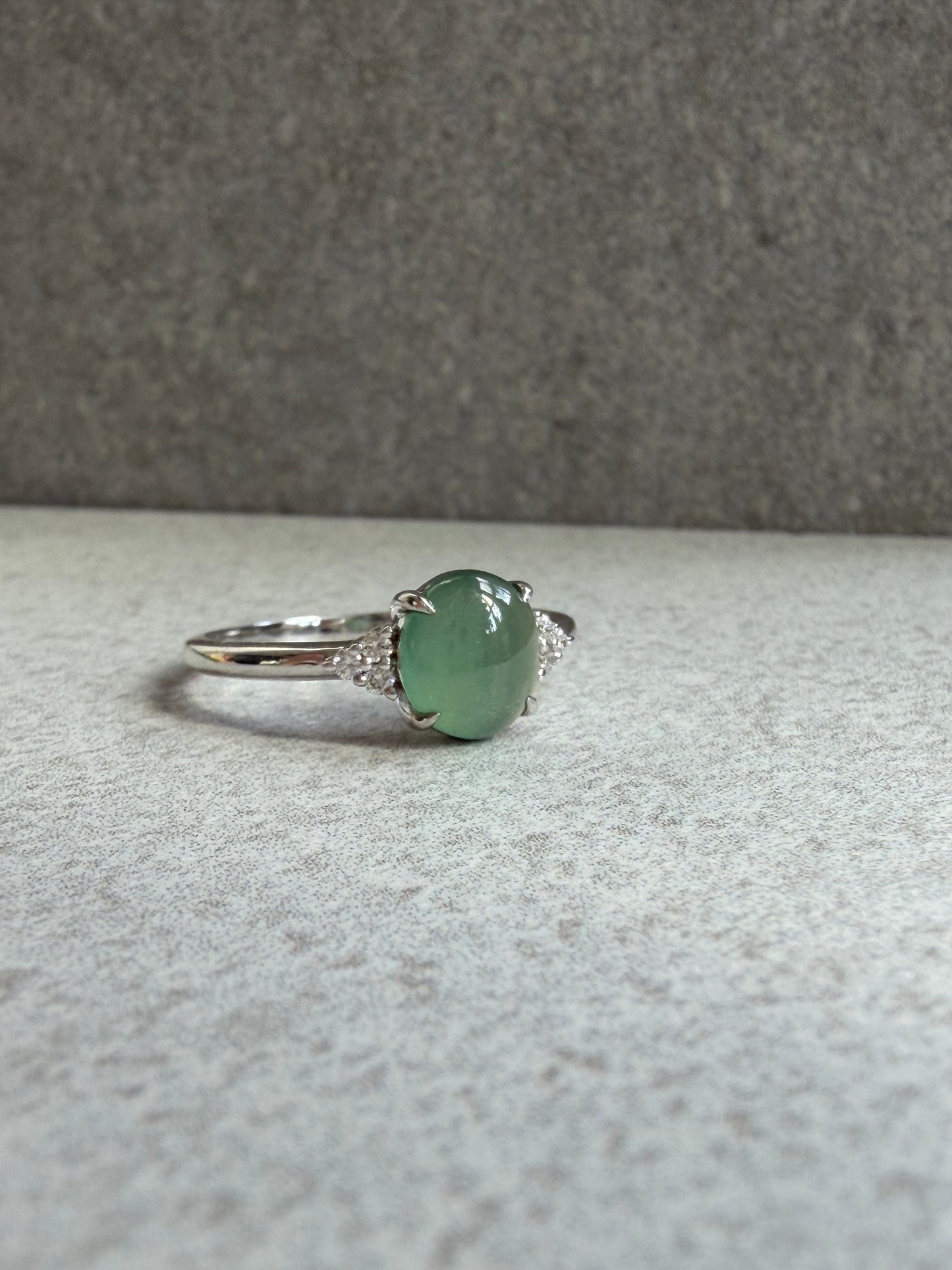 JO230016 A Drop in the Lake | Icy Blue watery jadeite cabochon in 18K white gold with natural diamonds