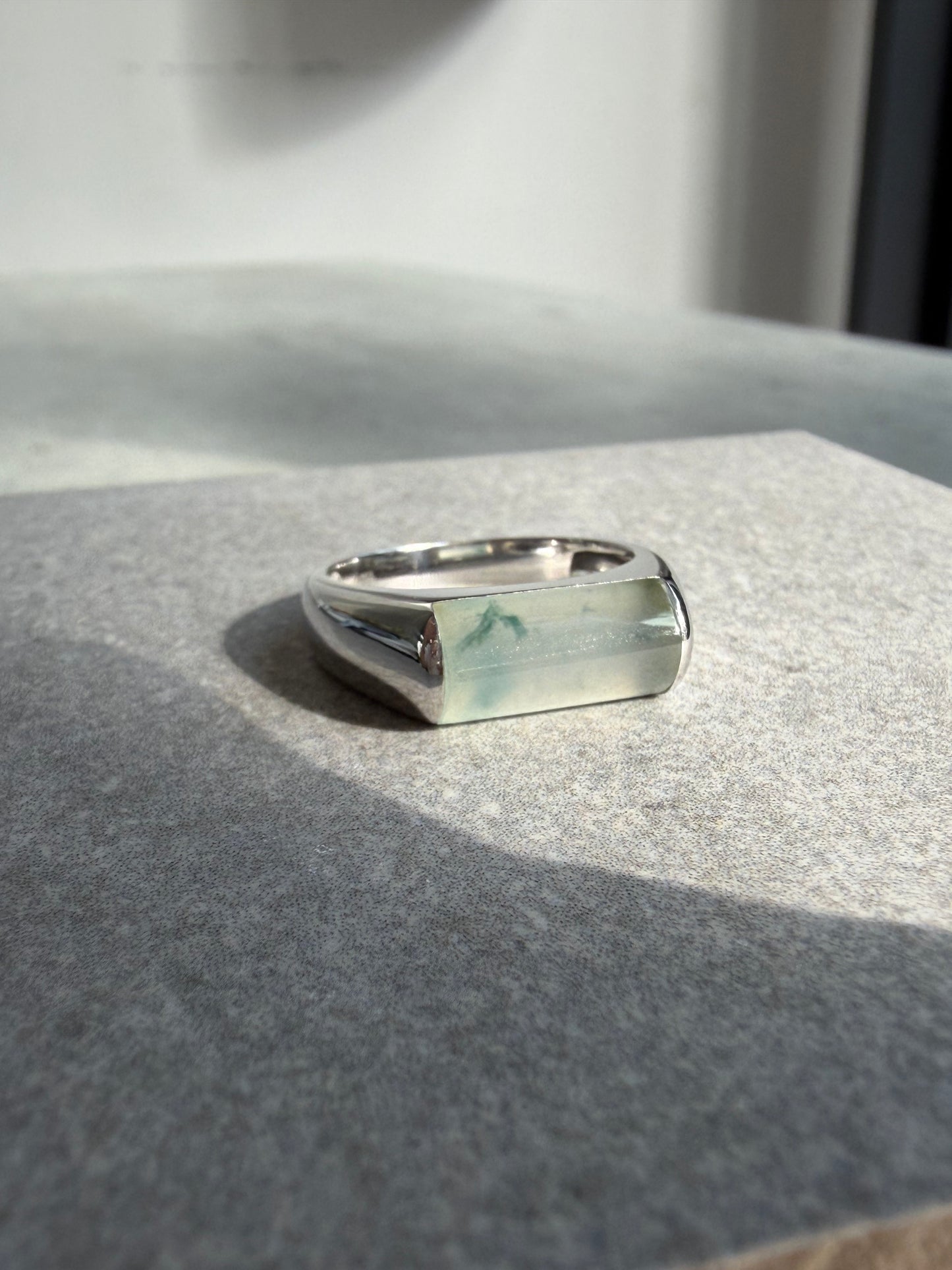 JO230013 Sprout in the Water | Icy Jadeite with Green and Yellow Marbling in Saddle Shaped Cabochon in 18K White Gold Ring