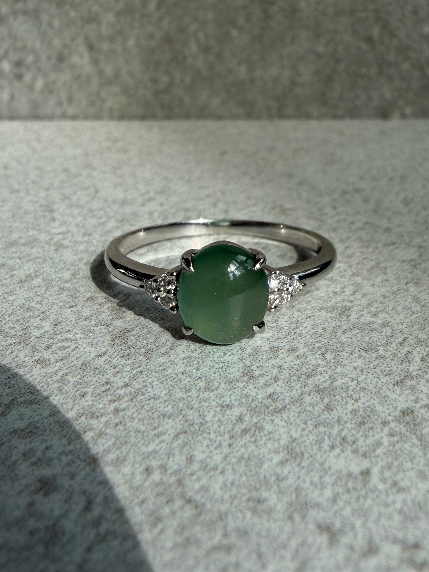 JO230016 A Drop in the Lake | Icy Blue watery jadeite cabochon in 18K white gold with natural diamonds