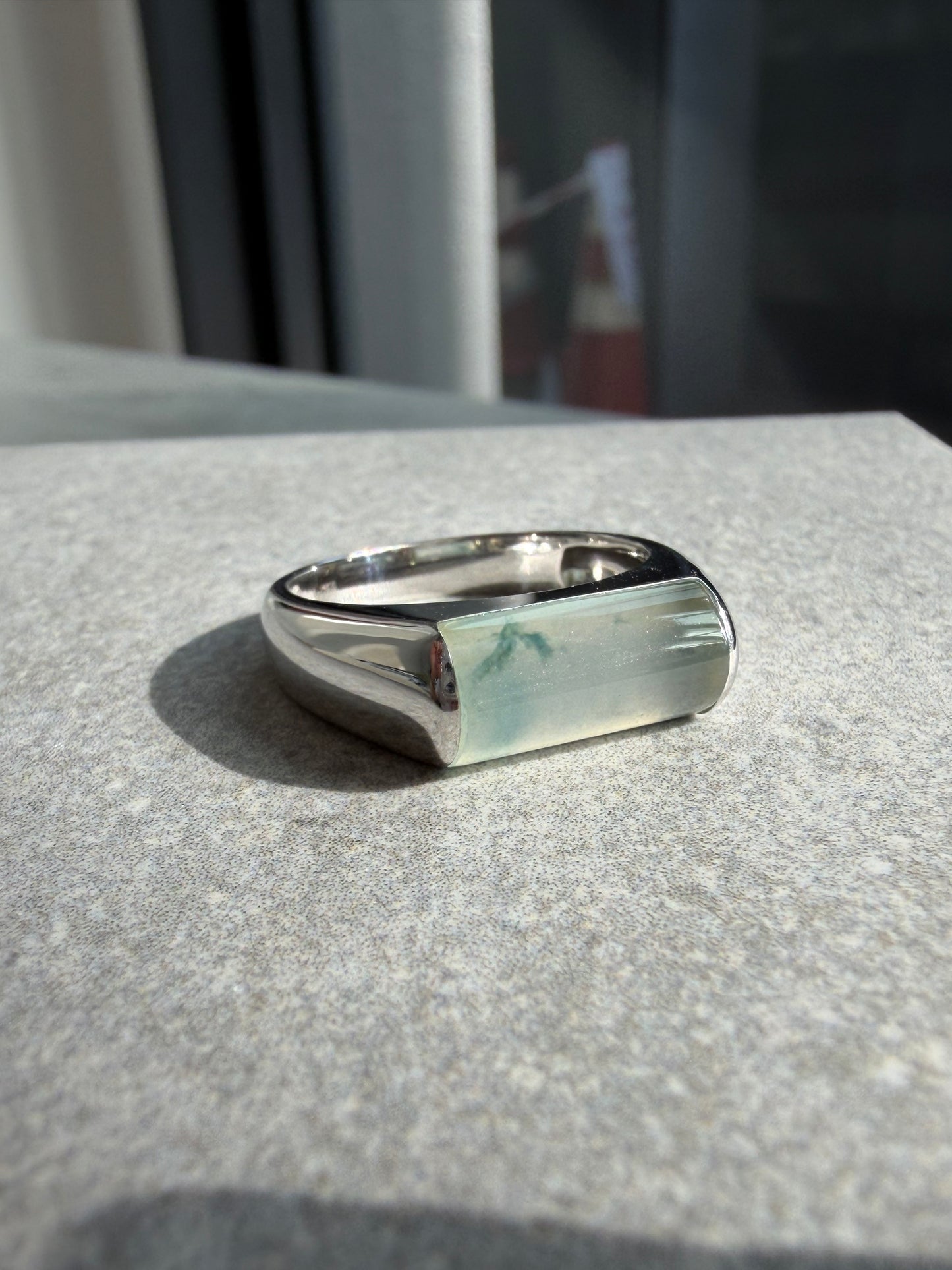 JO230013 Sprout in the Water | Icy Jadeite with Green and Yellow Marbling in Saddle Shaped Cabochon in 18K White Gold Ring