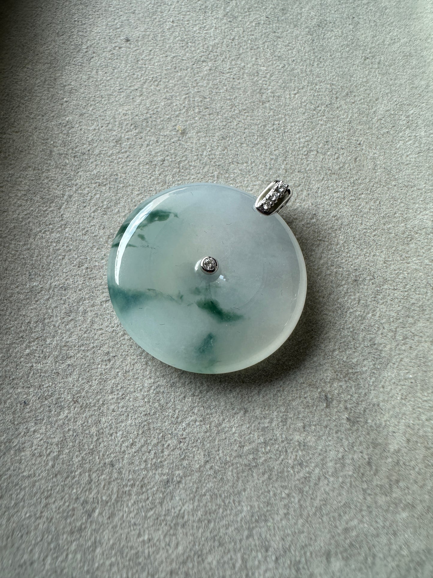 JPA230002 A Flow in Time | Icy White Burmese Jadeite Jade with Green Flower Marbling in Donut Carving set in 18K White Gold and Natural Diamonds