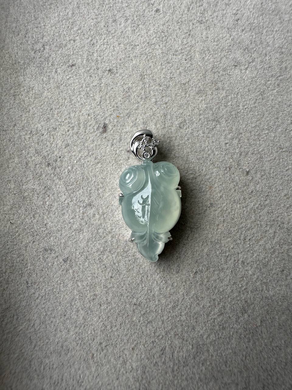 JA224009 Poisson | Icy Snowflake Blue-based Muna Jadeite in Goldfish Carving with 18K White Gold Setting